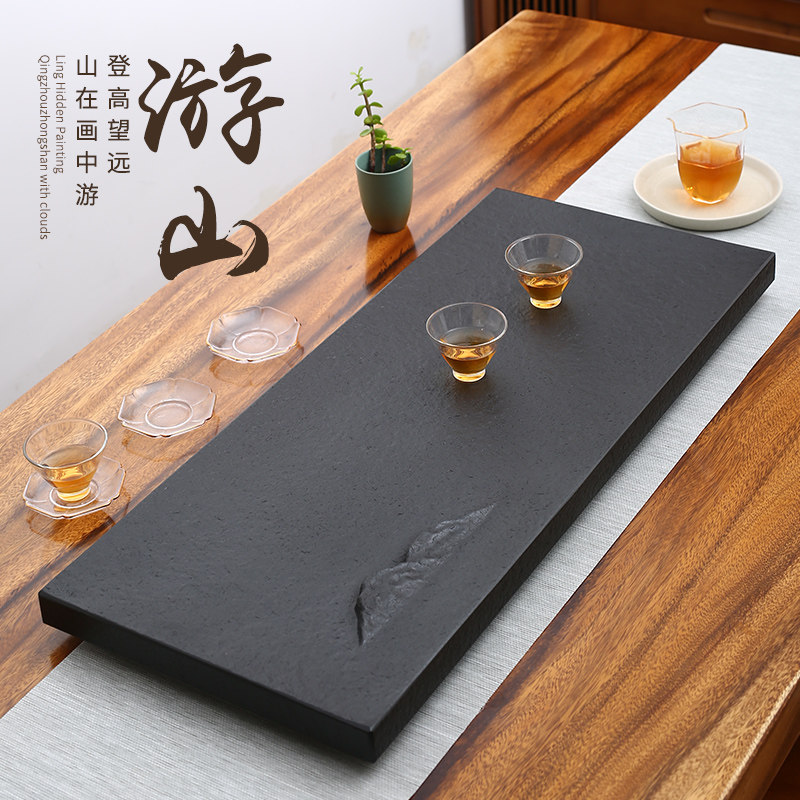 Wujin stone tea tray household simple small tea table Black gold natural stone whole custom embedded office tea sea