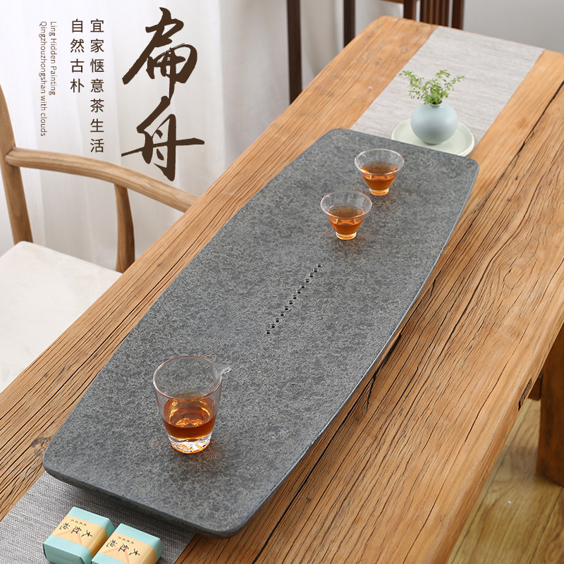 Natural jet black gold stone tea tray Household simple whole original stone tea sea small tea table dry bubble drainage tea tray