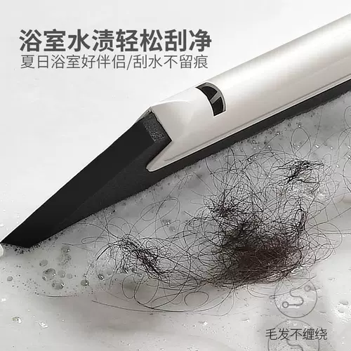 Ванная комната соскребает пол, подметающая волосы в ванной комнате.