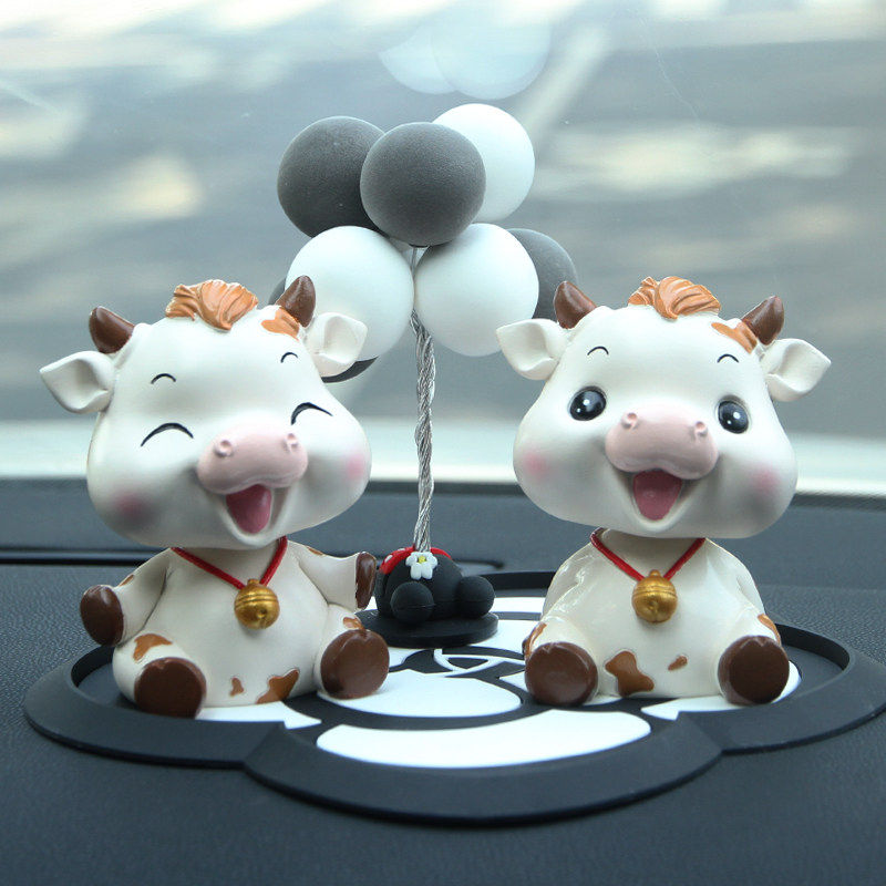 Car interior decoration net red shaking his head doll decoration supplies goddess car personality creative high-end car decoration