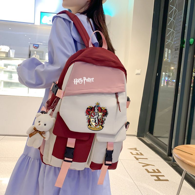 Harry Potter Co-Branded Backpack with Gryffindor and Hufflepuff Badges, Large Capacity School Bag for Elementary, Middle and High School Students Harry Potter Co-Branded Backpack with Gryffindor and Hufflepuff Badges, Large Capacity School Bag for Elementary, Middle and High School Students
