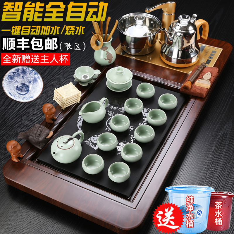 Drinking tea set household solid wood automatic meeting tea tray tea art complete set of four-in-one induction cooker tea table