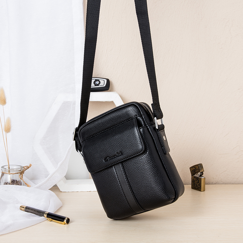 Anonise men's single shoulder bag genuine leather skew satchel small male Baotou layer Bull Leather Trumpet Vertical business Little Shoulder Bag