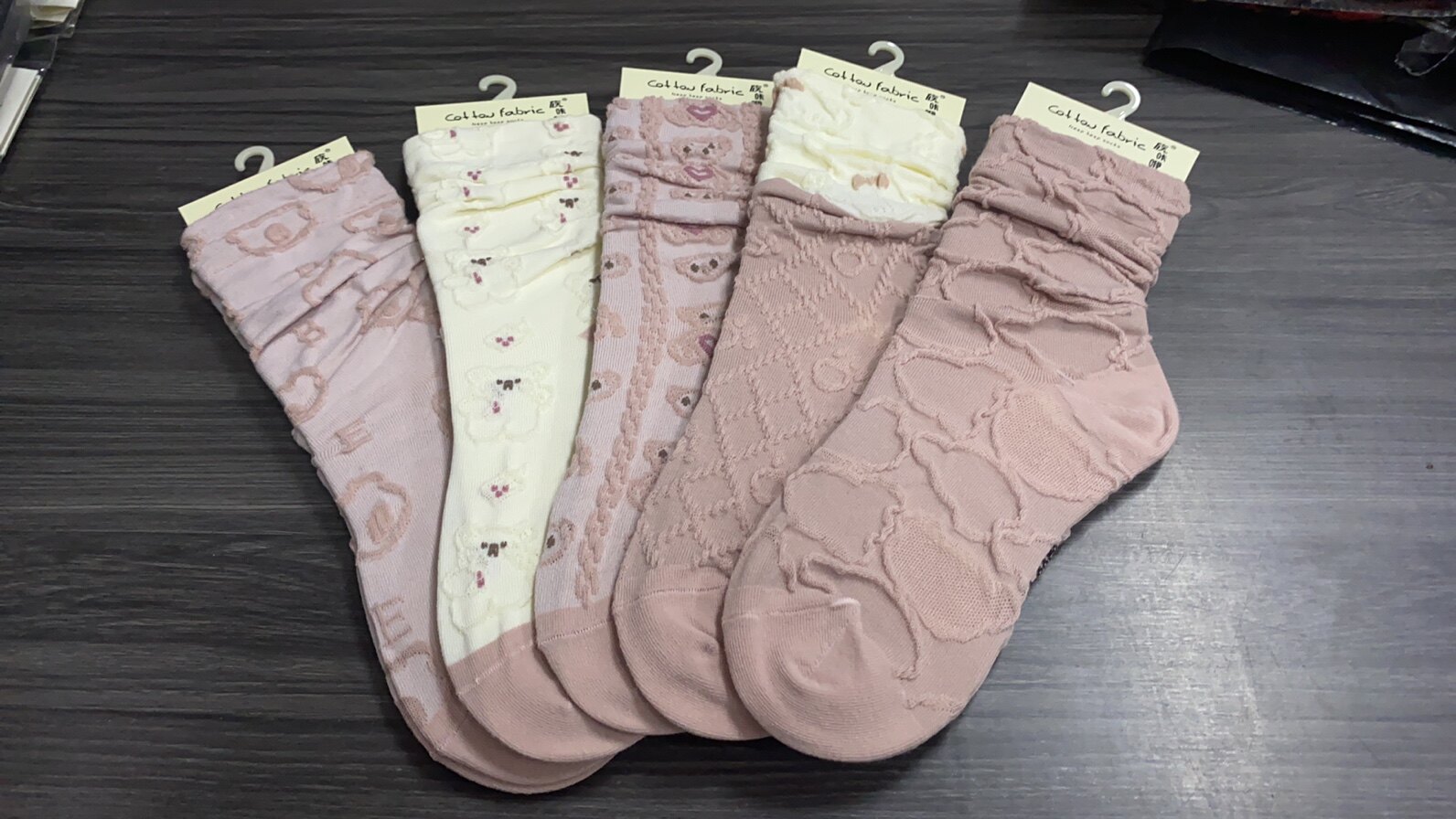 Five pairs of pink bubble socks for women