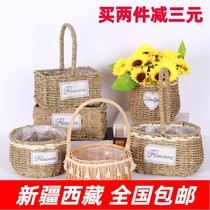 Xinjiang Tibetan straw weaving wicker weaving rattan weaving creative flower pots flower arrangements plumeria baskets green plants flowers woven wall hangings