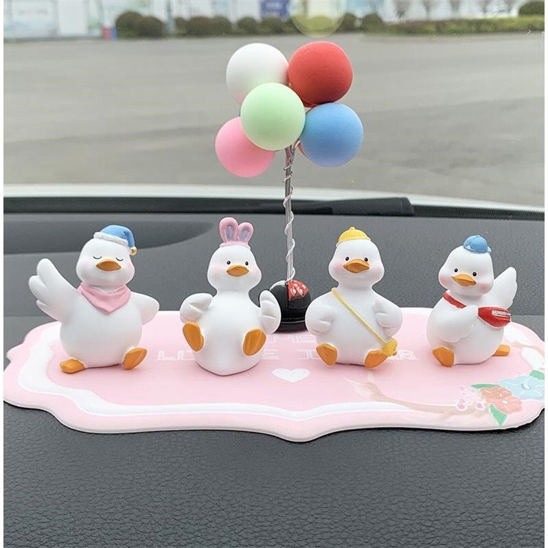 Car decoration center console decoration car interior decoration momo duck creative car cute doll beautiful decoration in the car