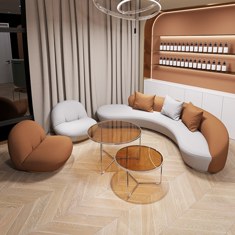 Beauty salon sample house display center light luxury arc orange sofa technology cloth lounge area reception arc corner special-shaped sofa