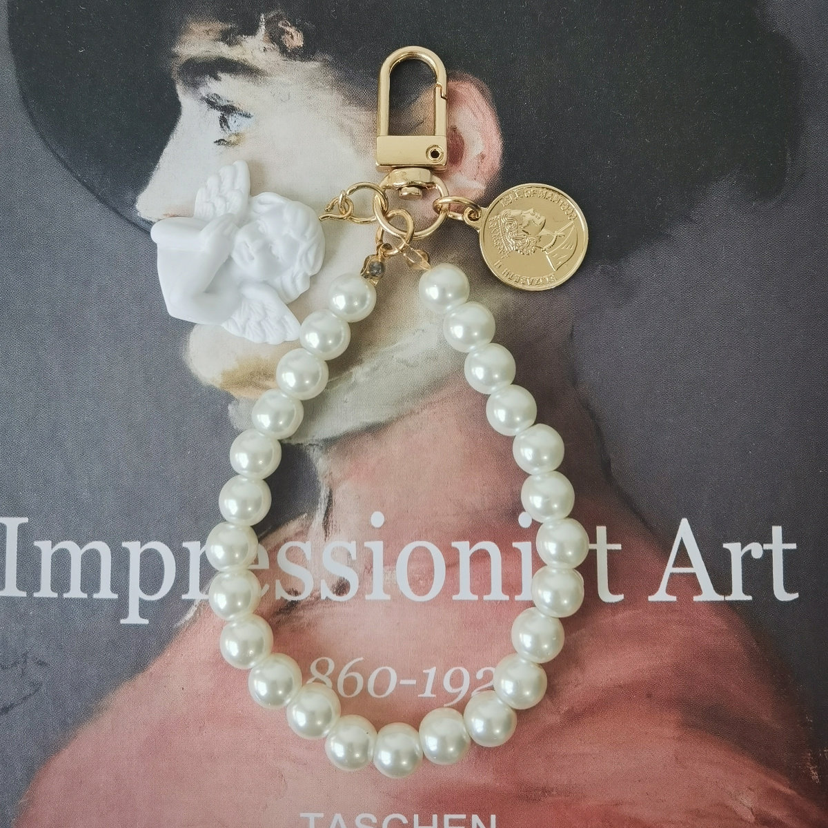 Baroque little angel pearl coin hanging