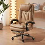 Офисное председатель Эргономик лежит на компьютерном кресле.