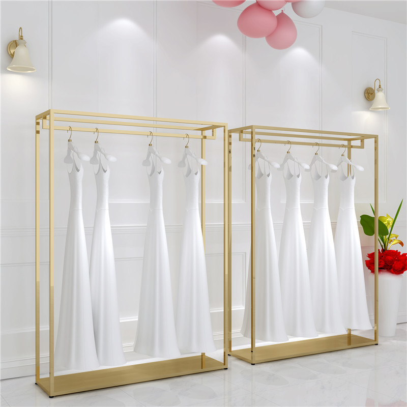 Mr. Tie's new wedding dress display stand floor-to-ceiling golden photo studio dress shelf bedroom balcony simple clothing shelf