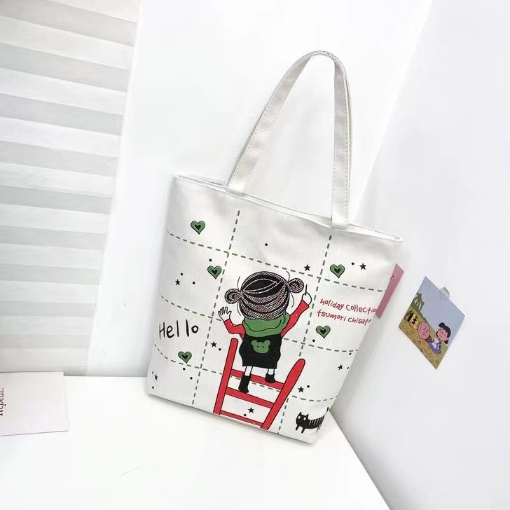 Korean version ins canvas bag messenger bag women's bag new 2022 net red with the same student small fresh hand shoulder bag