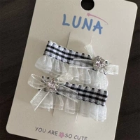 Черный ромбовидный узел из клетчатого кружева