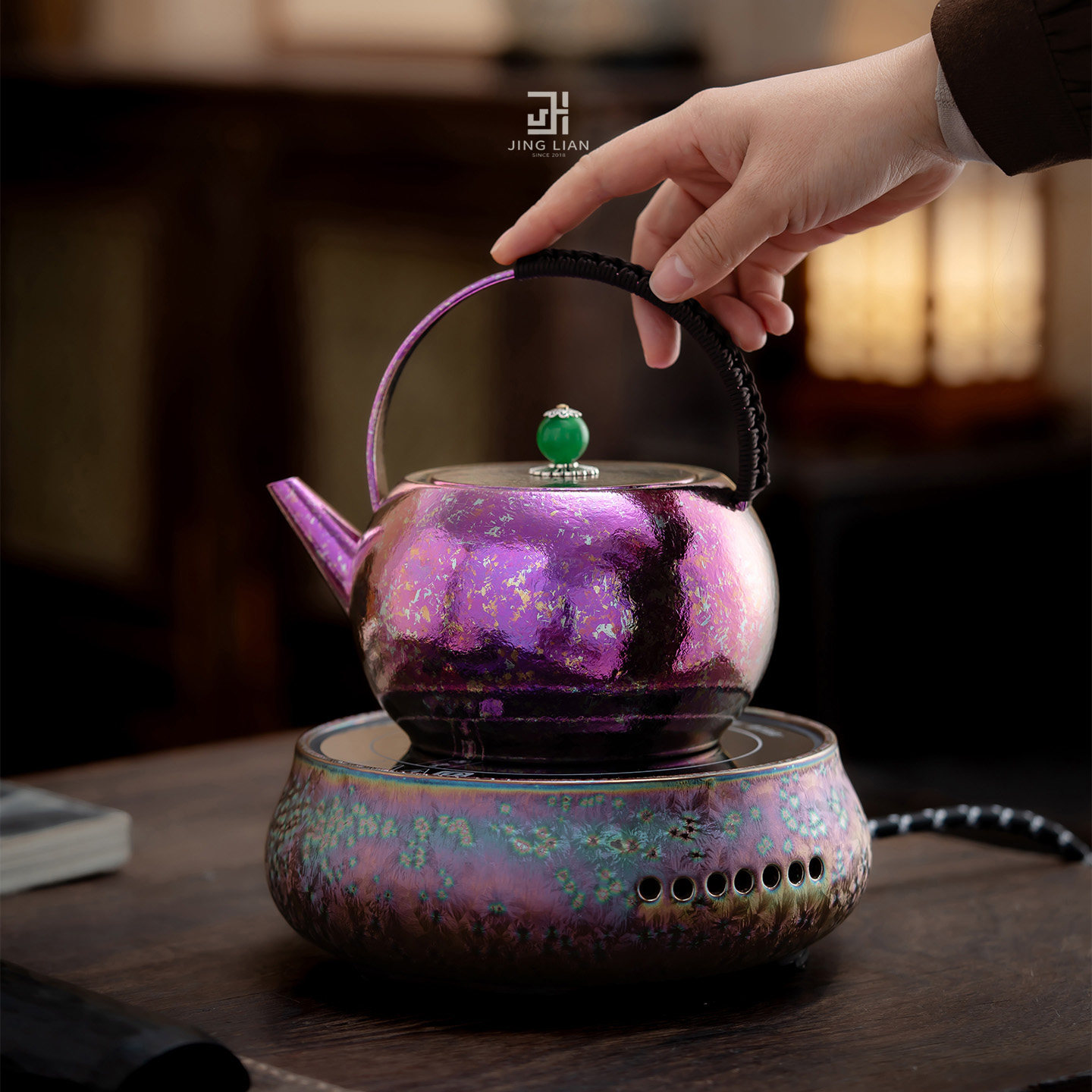 Jinglian pure titanium water boiling teapot glass boiled flower tea ceramic tea boiler electric ceramic stove lifting beam pot around the stove household tea set