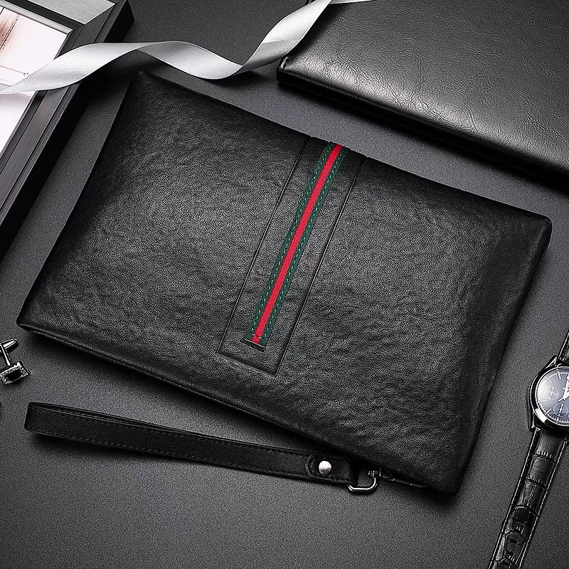 New business hand holding fashion trend handbag men's clutch bag first layer cowhide wallet leather men's bag