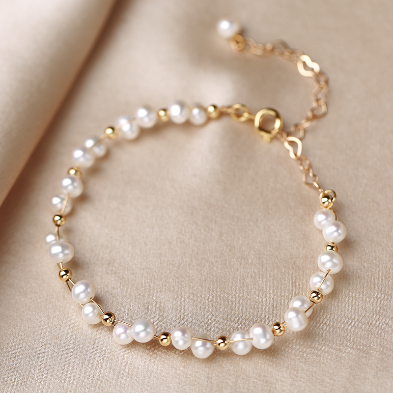 Su Chen natural freshwater pearl hand-held bead female summer ins niche design 14k gold woven fancy simple style