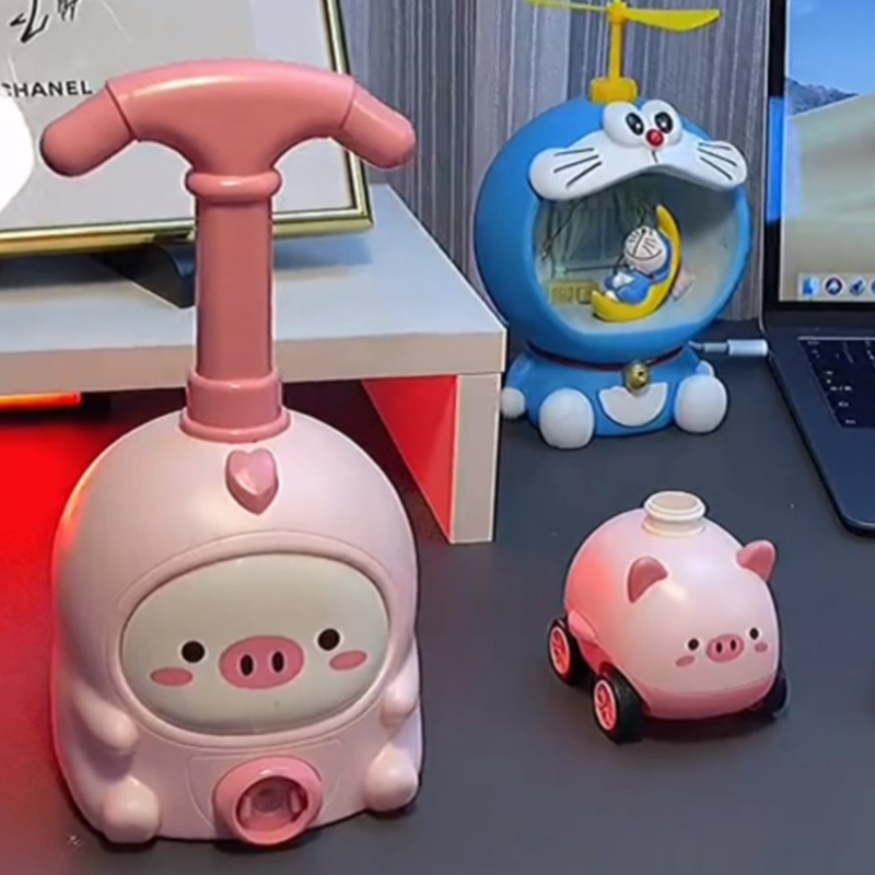Children's little pink pig feitian power car parent-child interactive aerodynamic car balloon car pressing inertia toy