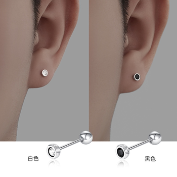 Black and white solitaire earrings with screws and buckles to support pierced ears in a simple way