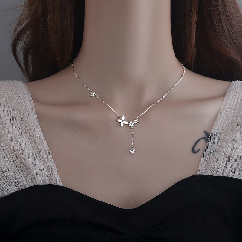 Flower necklace female summer 2022 new cold wind light luxury niche design fairy butterfly clavicle chain tassel necklace