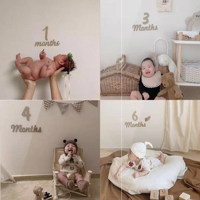 Newborn baby 100 days full moon plate with 100 days photo props to take birthday arrangement of 100 days background cloth in wind