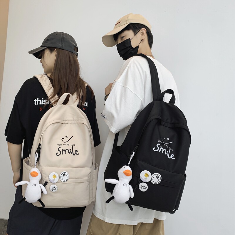 Large-capacity tide brand backpack simple casual junior high school students high school students backpack 2021 new schoolbag men