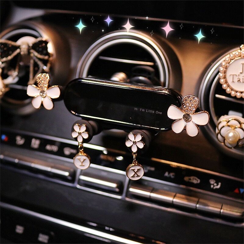 Car mobile phone rack navigation car gravity support frame creative multi-function mobile phone bracket net red goddess supplies