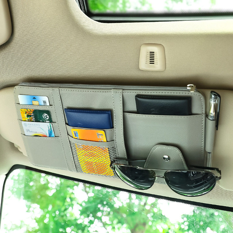 Automotive sunshade collects multi-functional collection of clamped glasses and carriage card card ticket clamps