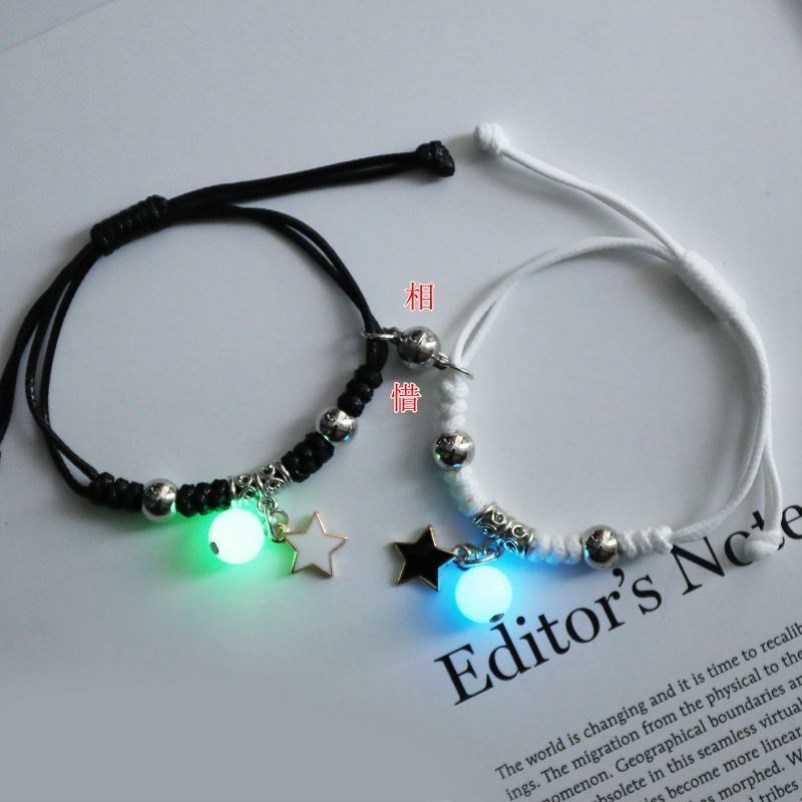 Couple's hand a pair of sensing vibrating girlfriends hand a student a pair of long-distance love artifact sensing luminous bracelet