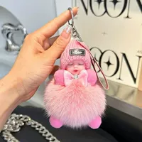 Розовая кукла