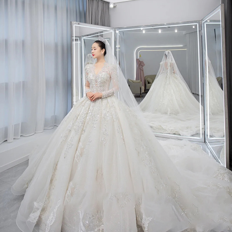 Long -sleeved light wedding dress 2023 new bride temperament, small, high -level sensor, luxury large trailer main gauze texture Long -sleeved light wedding dress 2023 new bride temperament, small, high -level sensor, luxury large trailer main gauze texture
