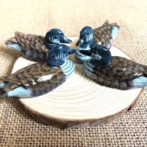 Four wooden ducks handmade solid wood carvings