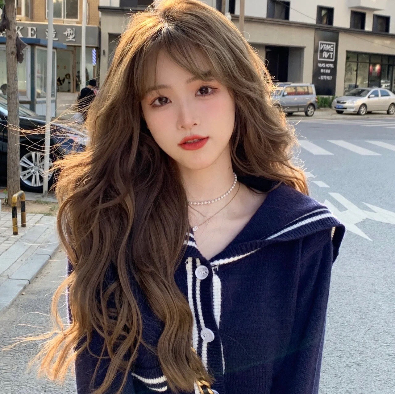 The wig of the sweet wig female curls large waves natural simulation of human hair daily temperament micro-roll full head cover