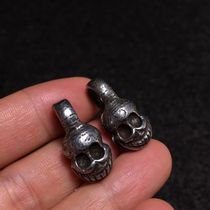 A pair of Tibetan high-end vintage cold iron cadaver small element accessories (data) 23mm long and 11mm wide