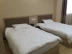 Nội thất khách sạn giường đơn giản hiện đại Trung Quốc Giường 1,2 m giường đôi tùy chỉnh nội thất khách sạn Giường gỗ 1,5 m smart tivi Nội thất khách sạn