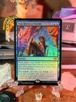 (Giraffe) Magic: The Gathering: Walking Between Realms Light and Thunder Station OTJ English Flash Gold 0070