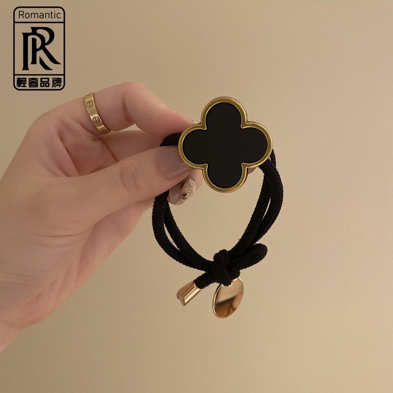 Korean four-leaf clover high-end head rope women's summer not strangled hair simple temperament ponytail tied hair ring black leather case