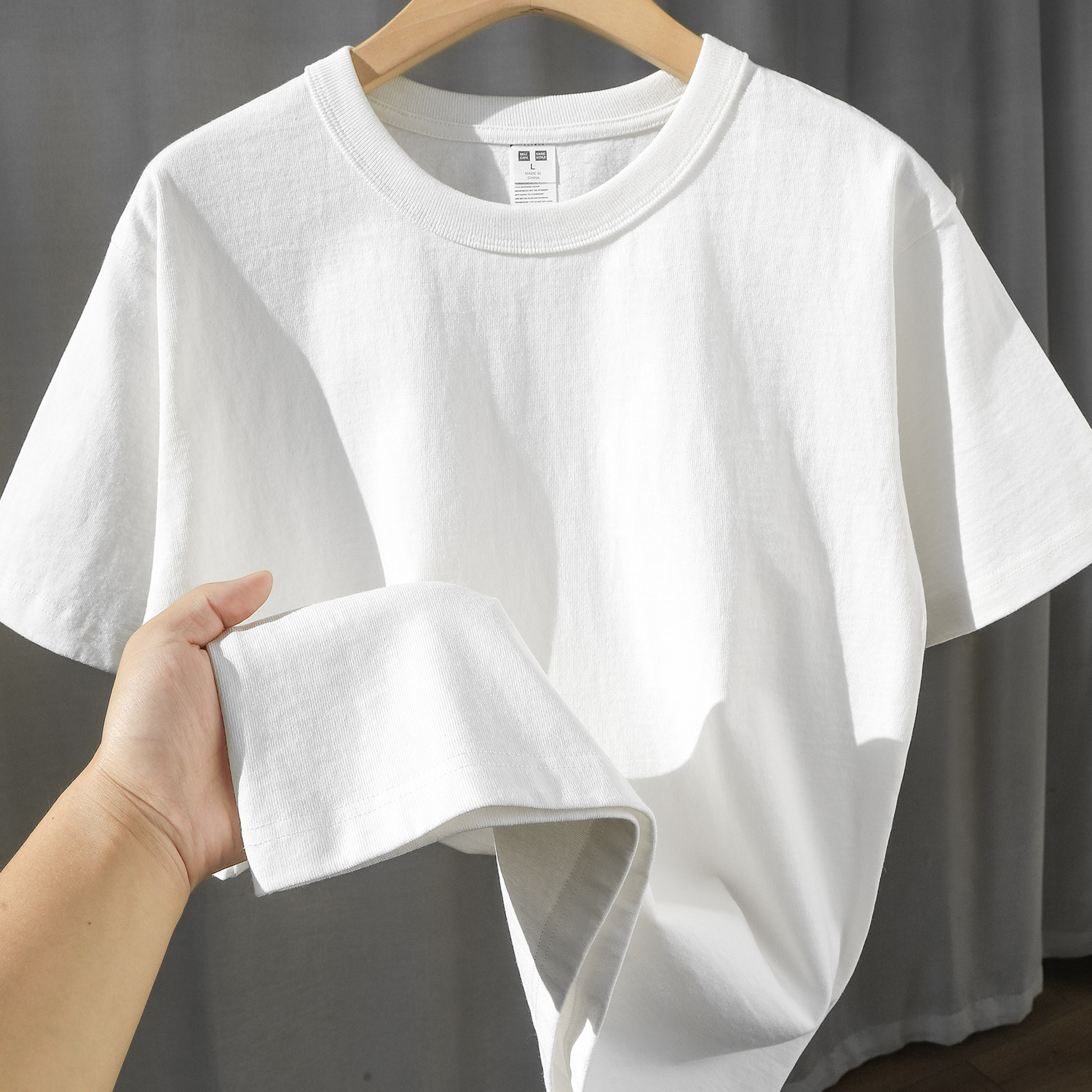 3本針デザイン！320gのヘビーウェイト新疆綿アメリカンスタイルのゆったりとした半袖Tシャツ、白い不透明なインナーレイヤー、男女兼用、夏用。