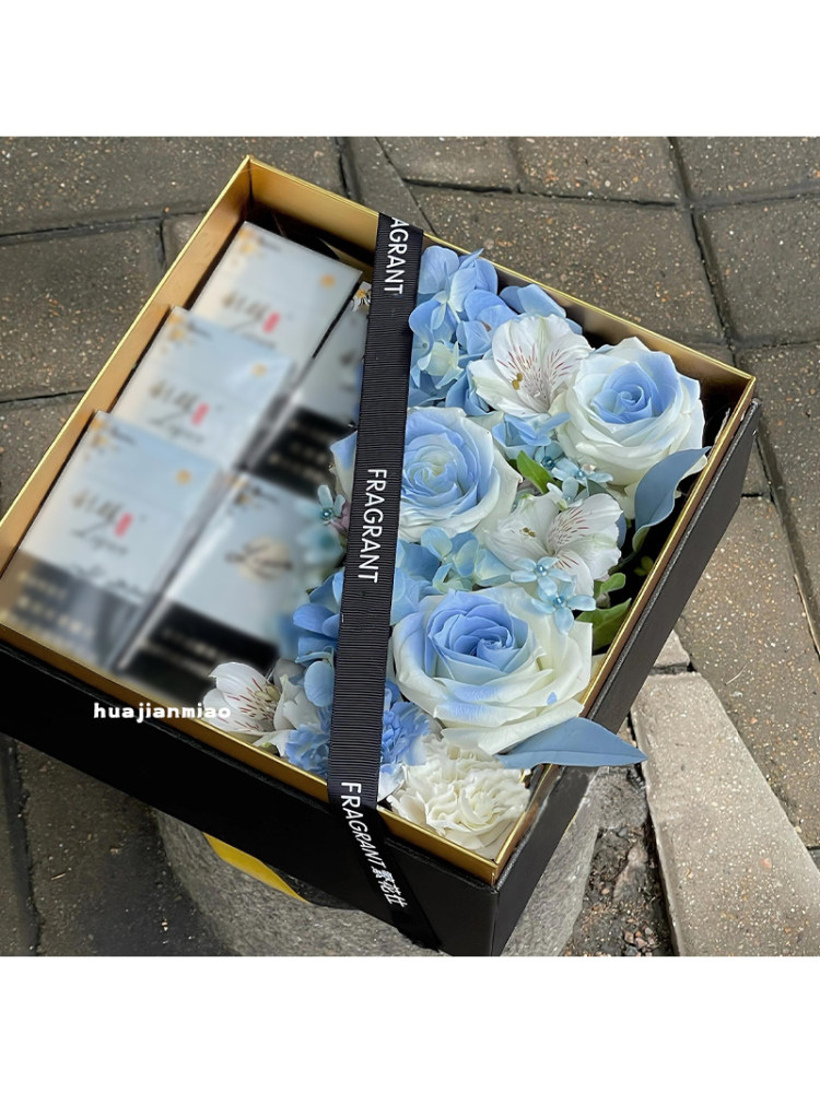 cigarette box bouquet Alcohol & | The City Flower Cigarette arrangement, cigarette bouquet Stock