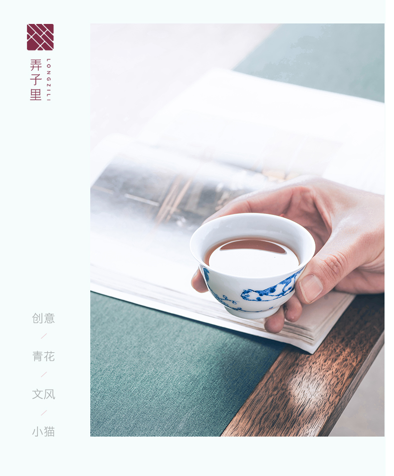 Figure in the glass cup of jingdezhen ceramic tea set left blue and white cat cup expressions using hand - made master cup of glass