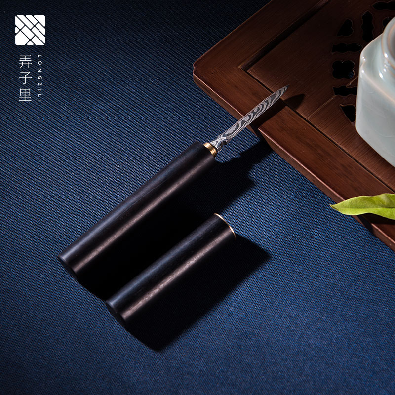 The Custom in The child. The Purple light tan solid wood tea knife. Pry tea cake. The tea taking with zero