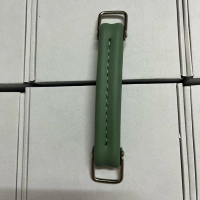 Темно-зеленая ручка.