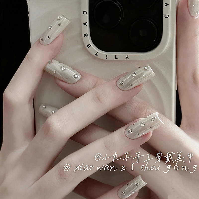 ins Unique White Aurora Handmade Nails with Rhinestones, Steel Beads, Stars, Solid Color, European and American Style, Medium-Length Nail Art ins Unique White Aurora Handmade Nails with Rhinestones, Steel Beads, Stars, Solid Color, European and American Style, Medium-Length Nail Art