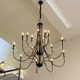 French Retro Living Room Chandelier Black Candle Staircase Chandelier Pearl Romantic Light Luxury Hotel Bedroom Crystal Lighting