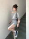 Korean age-reducing casual sportswear suit for women in summer, simple waistline, one-line shoulder, slanted shoulder, short-sleeved skirt, two-piece set