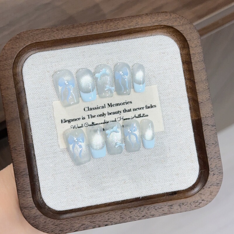 Popular Little Red Book Ice-Clear Light-Catching Cat-Eye Milky Blue French Bow Fresh and Cute Sweet Handmade Press-On Nails Popular Little Red Book Ice-Clear Light-Catching Cat-Eye Milky Blue French Bow Fresh and Cute Sweet Handmade Press-On Nails