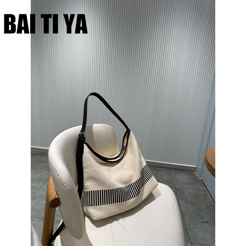 Bai Tiya Lazy Style Large Capacity Striped Canvas Bag Bucket Bag Women's 2025 New Tote Bag Casual Large Bag Bai Tiya Lazy Style Large Capacity Striped Canvas Bag Bucket Bag Women's 2025 New Tote Bag Casual Large Bag
