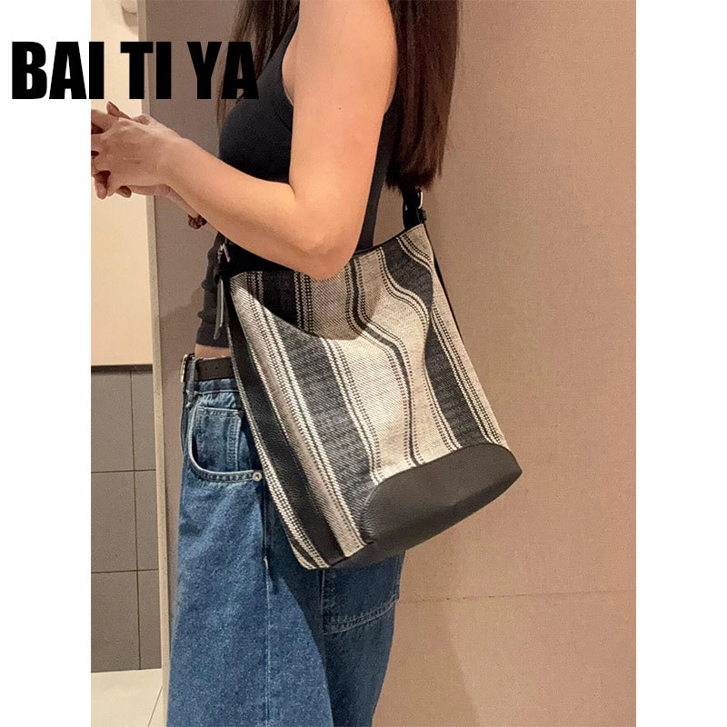 Retro Stripesd Casual Bucket Bag for Women 2026 New Accessible Luxury Niche High-End Versatile One-Shoulder Cross-Body Bag Retro Stripesd Casual Bucket Bag for Women 2026 New Accessible Luxury Niche High-End Versatile One-Shoulder Cross-Body Bag