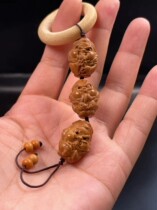 Olive stone Zhong Kui carved Q version Zhong Kui ghost catching hand twisted single cell phone chain niche cute cultural toy