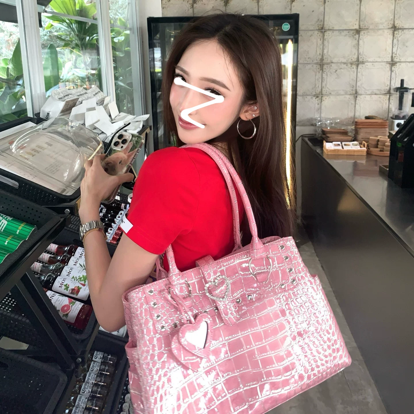 Fuchsia capacious one-shoulder bag, crocodile print