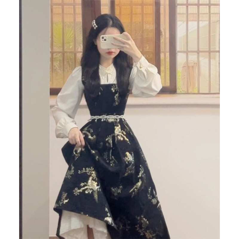 女性向けの新しい中国風改良型チャイナドレス。ハイエンドなデザインで、春秋向けのニッチなフェイクツーピースAラインロングスカート。