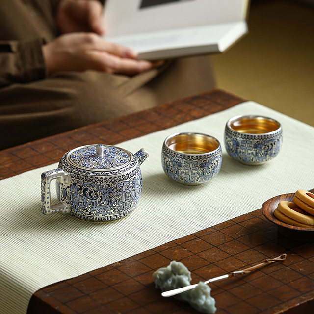 High-end handmade gilt silver teapot household tea and water separation single pot tea cup Kung Fu tea set one pot two cups